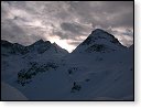 Slunce schovan za Grossglocknerem. Vlevo nejvt - Eiskogele. Vpravo (opticky) nejvt Tauernkogel.